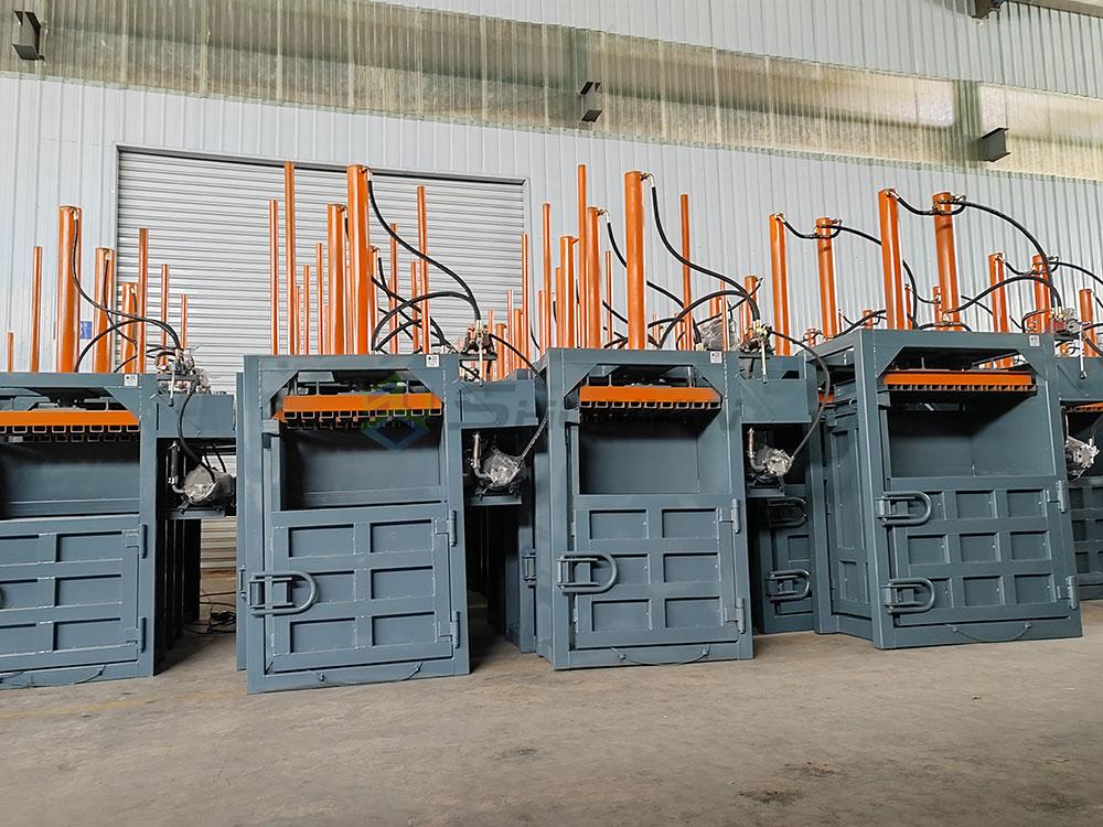Multi-functional baler with adjustable settings for various materials.